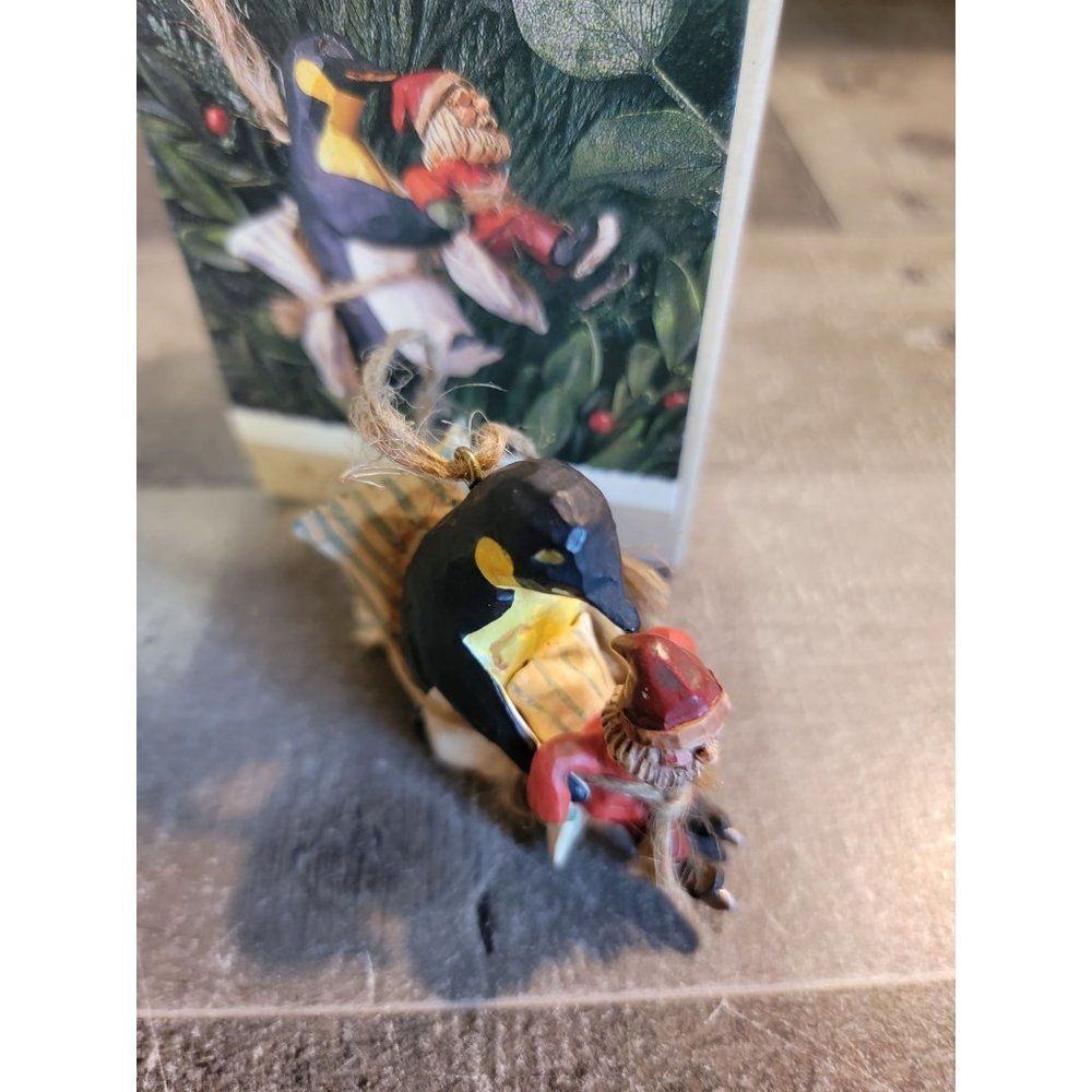 Hallmark 1995 learning to skate ornament Xmas Decor folk art penguin